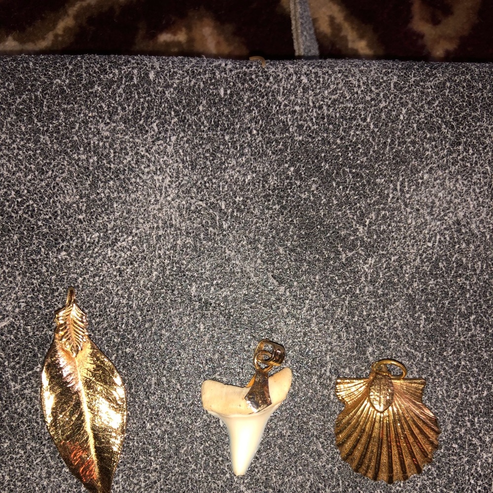 Three goldtone‎ pendants